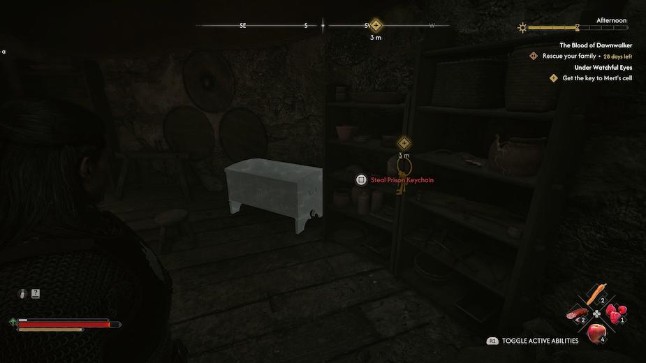 The Prison Keychain interaction beside shelving in the overseer's room